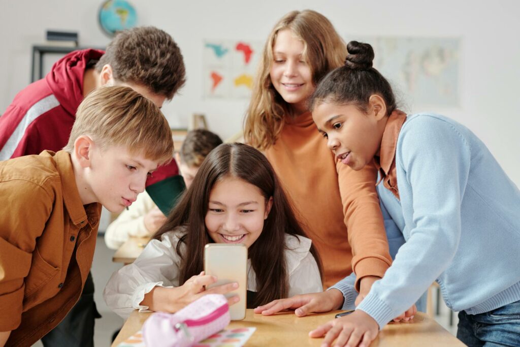 happy students in classroom interacting