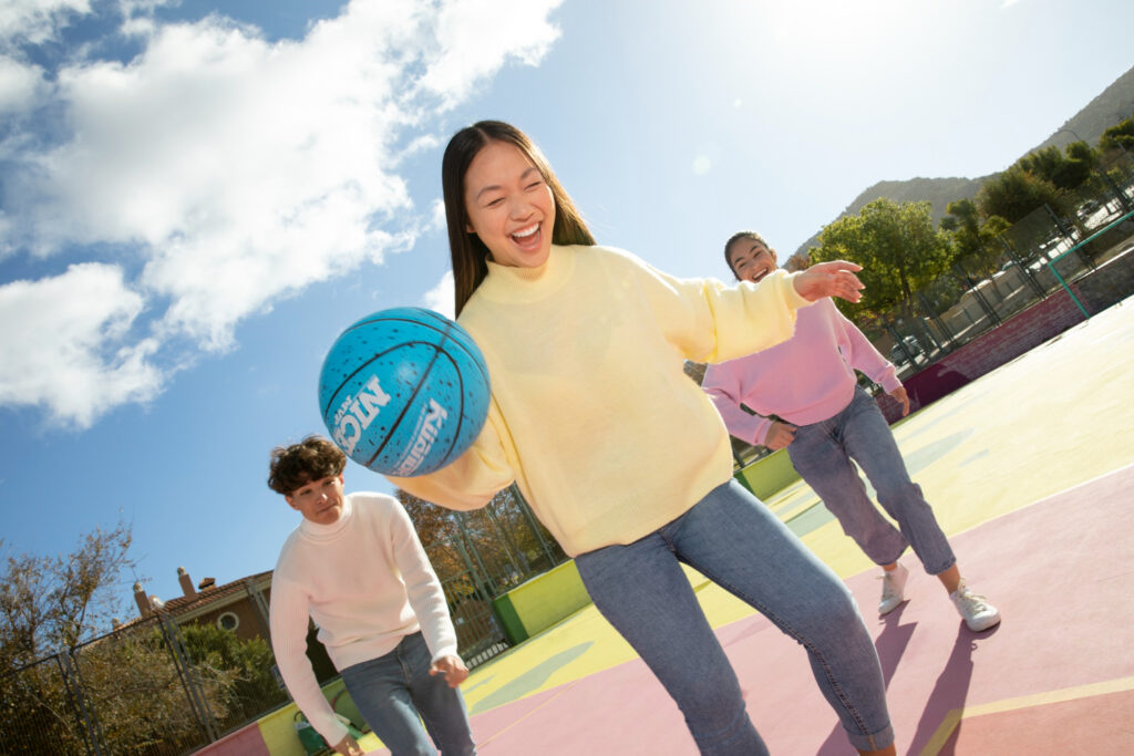 young students playing sports